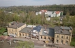Nádraží Leisnig. Renovace střechy památkově chráněné budovy s puren® MetalFix.